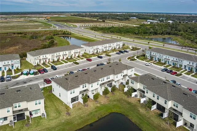 a view of a city with an ocean view