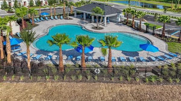 a front view of a house with swimming pool