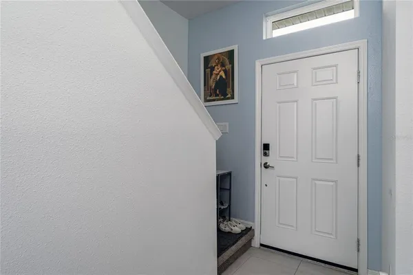 a view of a livingroom with a white door