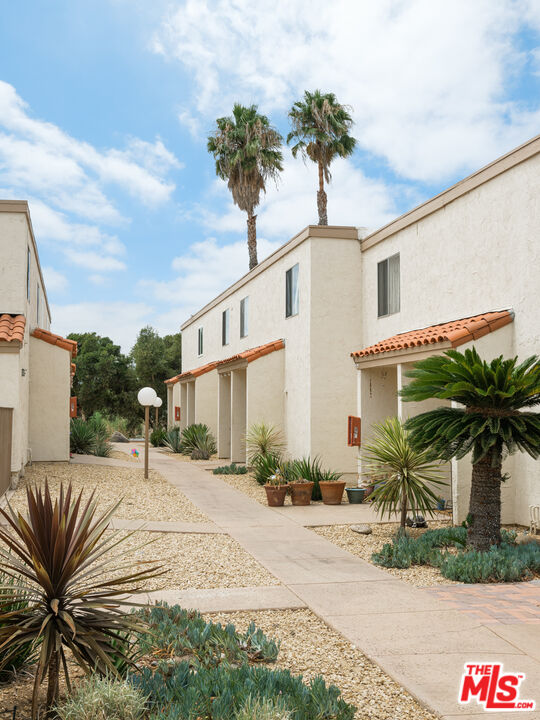 748 North 3rd Street El Cajon, CA 92021 - Photo 6 of 9 a view of a house with a yard