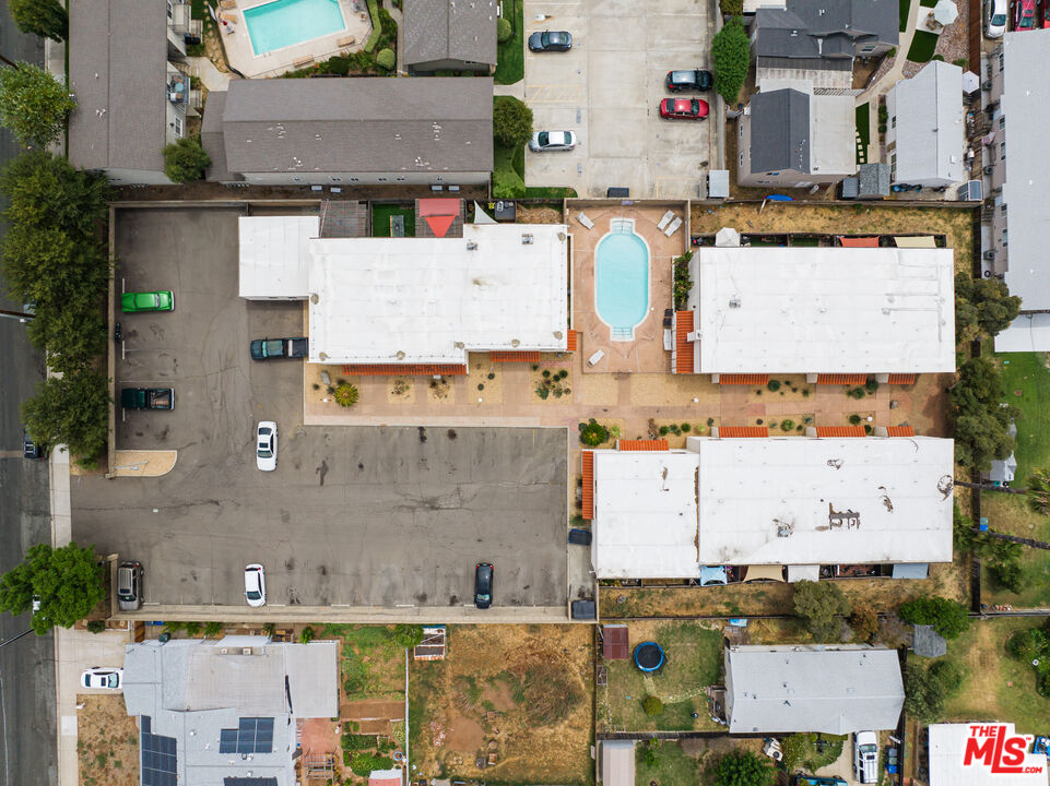 748 North 3rd Street El Cajon, CA 92021 - Photo 9 of 9 an aerial view of residential houses with outdoor space