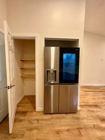 a view of a kitchen with a sink