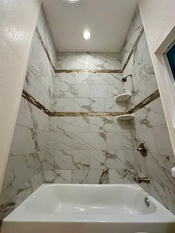 a bathroom with a bathtub