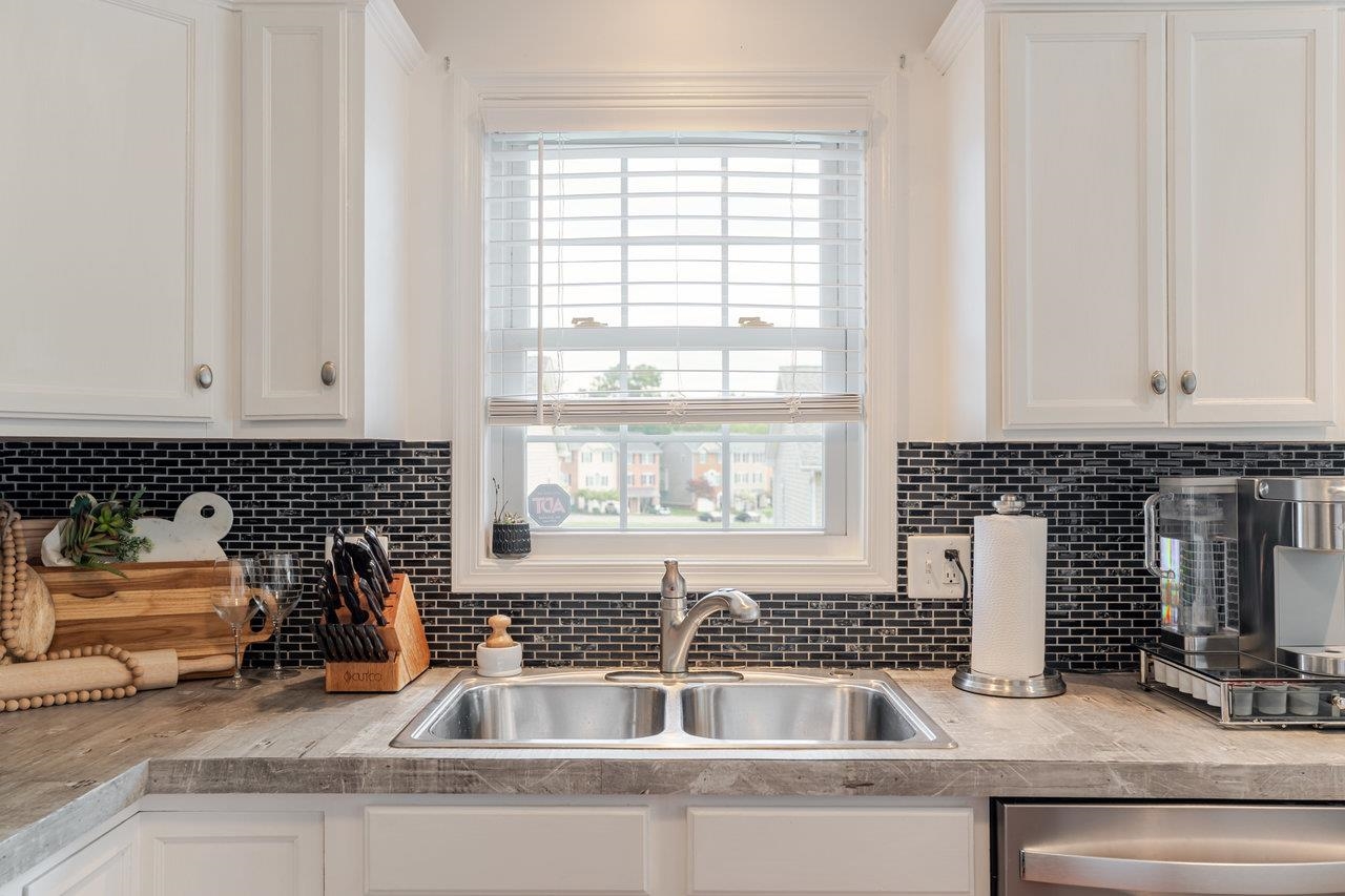 3035 Taylor Spring Lane Harrisonburg, VA 22801 - Photo 13 of 55 a kitchen with a sink and a window