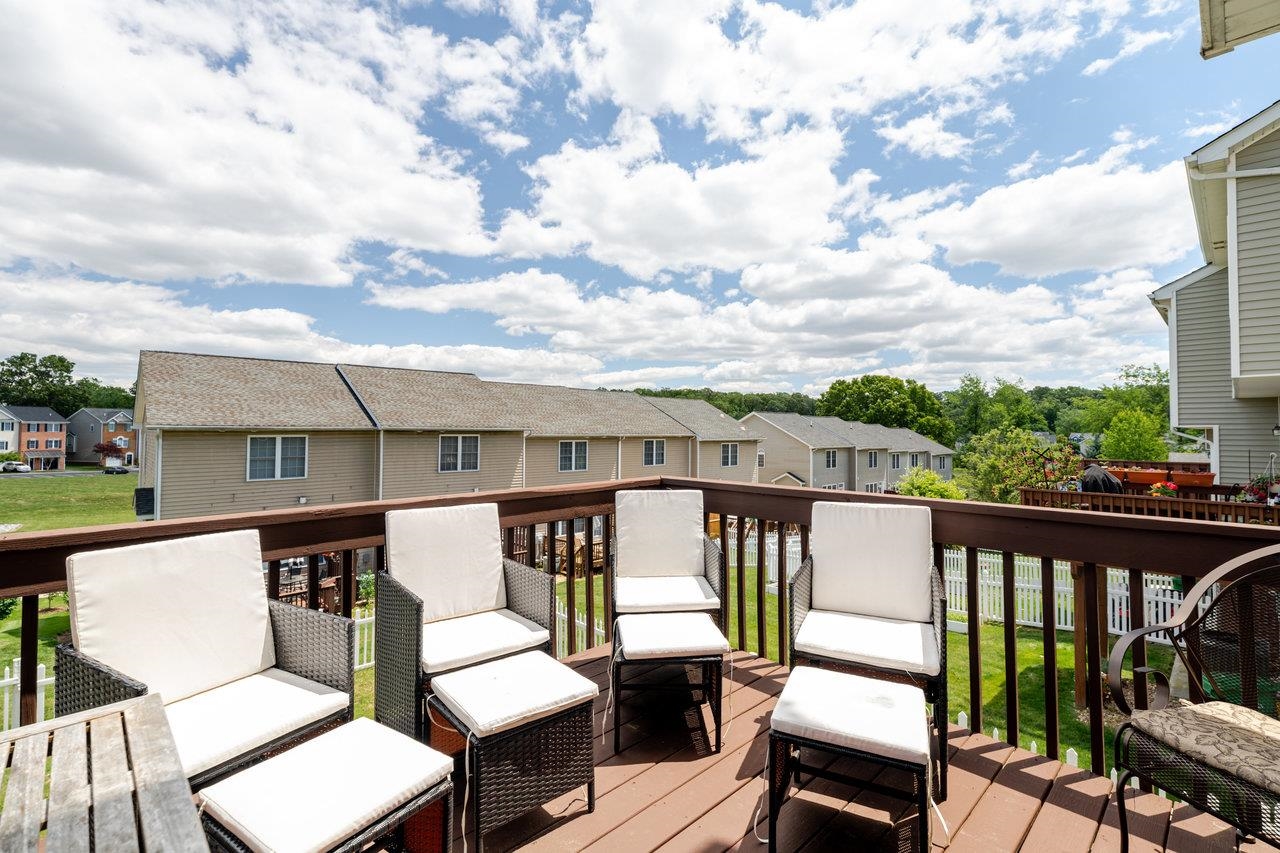 3035 Taylor Spring Lane Harrisonburg, VA 22801 - Photo 18 of 55 a view of a chairs and table in the balcony