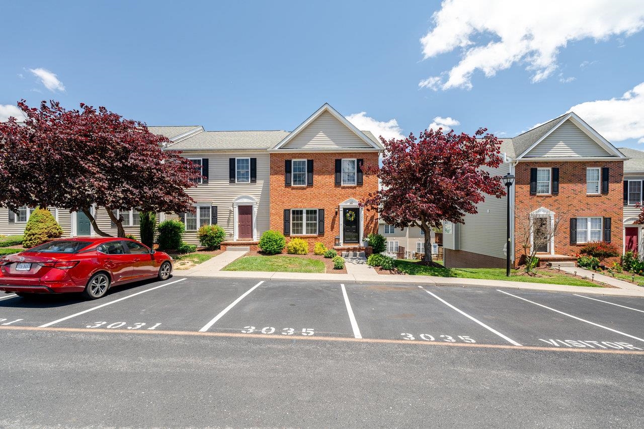 3035 Taylor Spring Lane Harrisonburg, VA 22801 - Photo 2 of 55 a view of a parked cars in front of a house