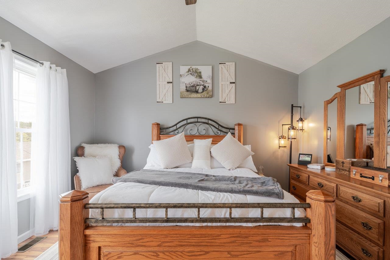 3035 Taylor Spring Lane Harrisonburg, VA 22801 - Photo 23 of 55 a bedroom with a bed and a table in it