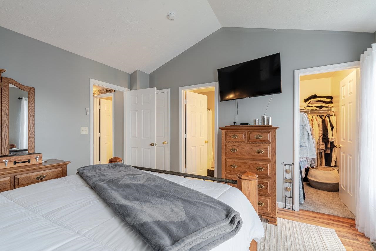 3035 Taylor Spring Lane Harrisonburg, VA 22801 - Photo 25 of 55 a bedroom with a bed and flat screen tv