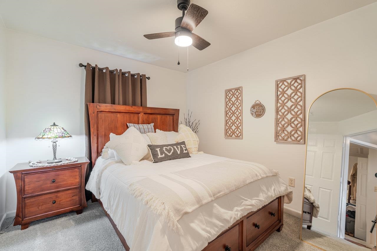 3035 Taylor Spring Lane Harrisonburg, VA 22801 - Photo 29 of 55 a bedroom with a bed and a lamp on the dresser