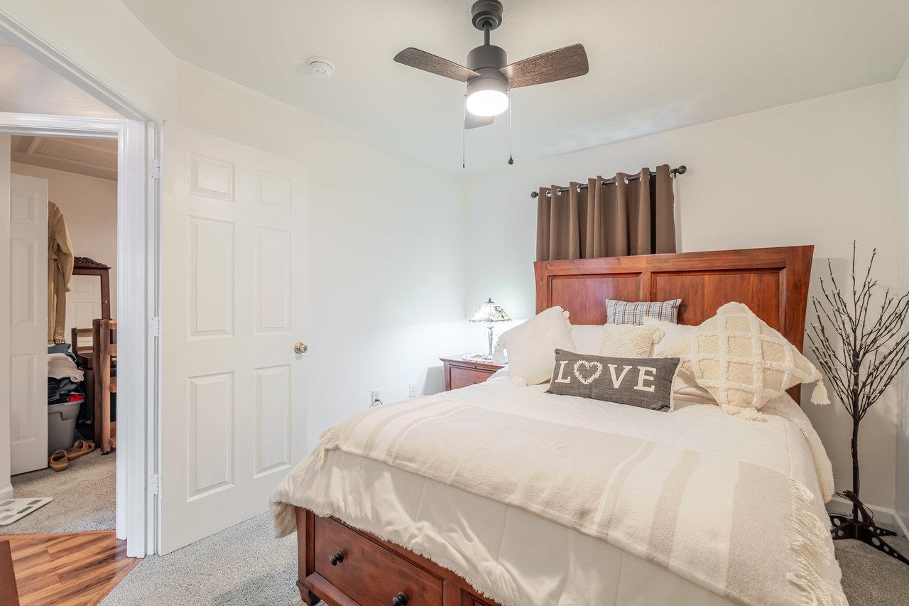3035 Taylor Spring Lane Harrisonburg, VA 22801 - Photo 30 of 55 a bedroom with a bed and a chandelier