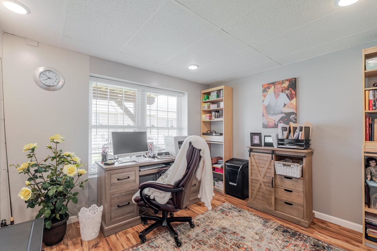 3035 Taylor Spring Lane Harrisonburg, VA 22801 - Photo 36 of 55 a view of a workspace with furniture and a window
