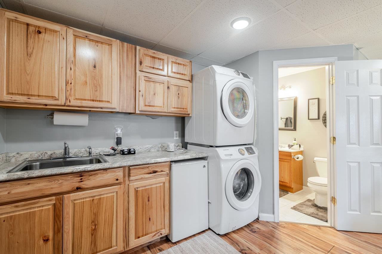 3035 Taylor Spring Lane Harrisonburg, VA 22801 - Photo 42 of 55 a utility room with sink dryer and washer
