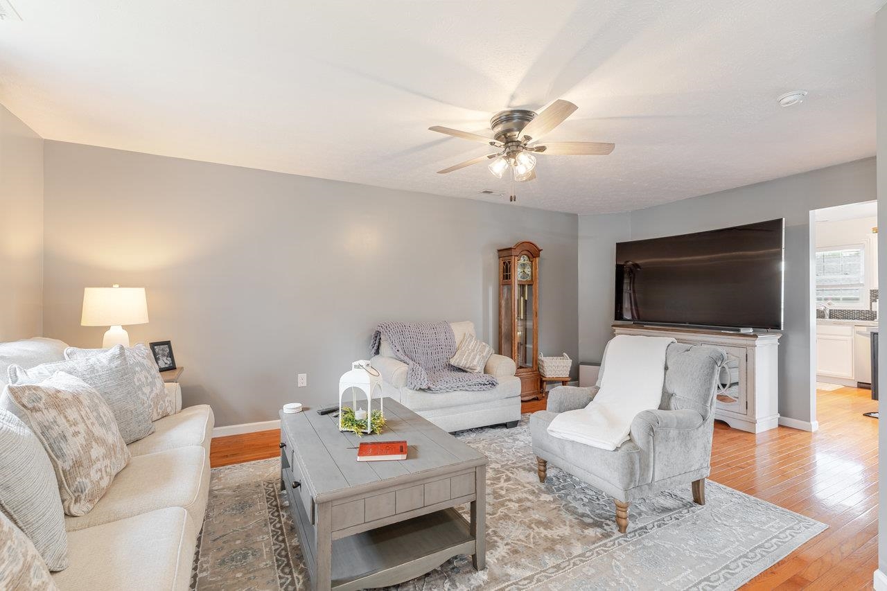 3035 Taylor Spring Lane Harrisonburg, VA 22801 - Photo 5 of 55 a living room with furniture and a flat screen tv