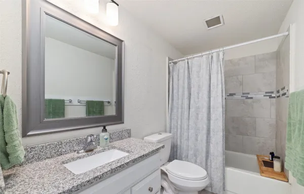 a view of room with workspace and a window