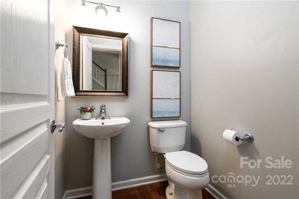 669 6th Baxter Crossing Fort Mill, SC 29708 - Photo 15 of 39 a bathroom with a toilet sink and mirror