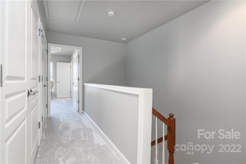669 6th Baxter Crossing Fort Mill, SC 29708 - Photo 18 of 39 a view of a hallway with wooden floor