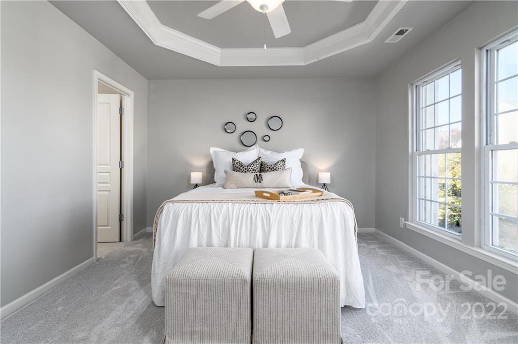 669 6th Baxter Crossing Fort Mill, SC 29708 - Photo 20 of 39 a bedroom with a bed and window
