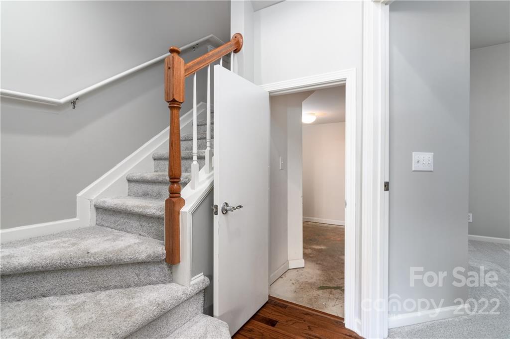 669 6th Baxter Crossing Fort Mill, SC 29708 - Photo 26 of 39 a view of entryway and hall with wooden floor