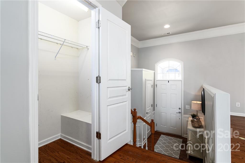 669 6th Baxter Crossing Fort Mill, SC 29708 - Photo 7 of 39 a room that has a bed and a closet in it
