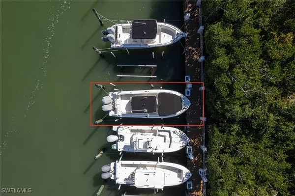 a view of a balcony with furniture