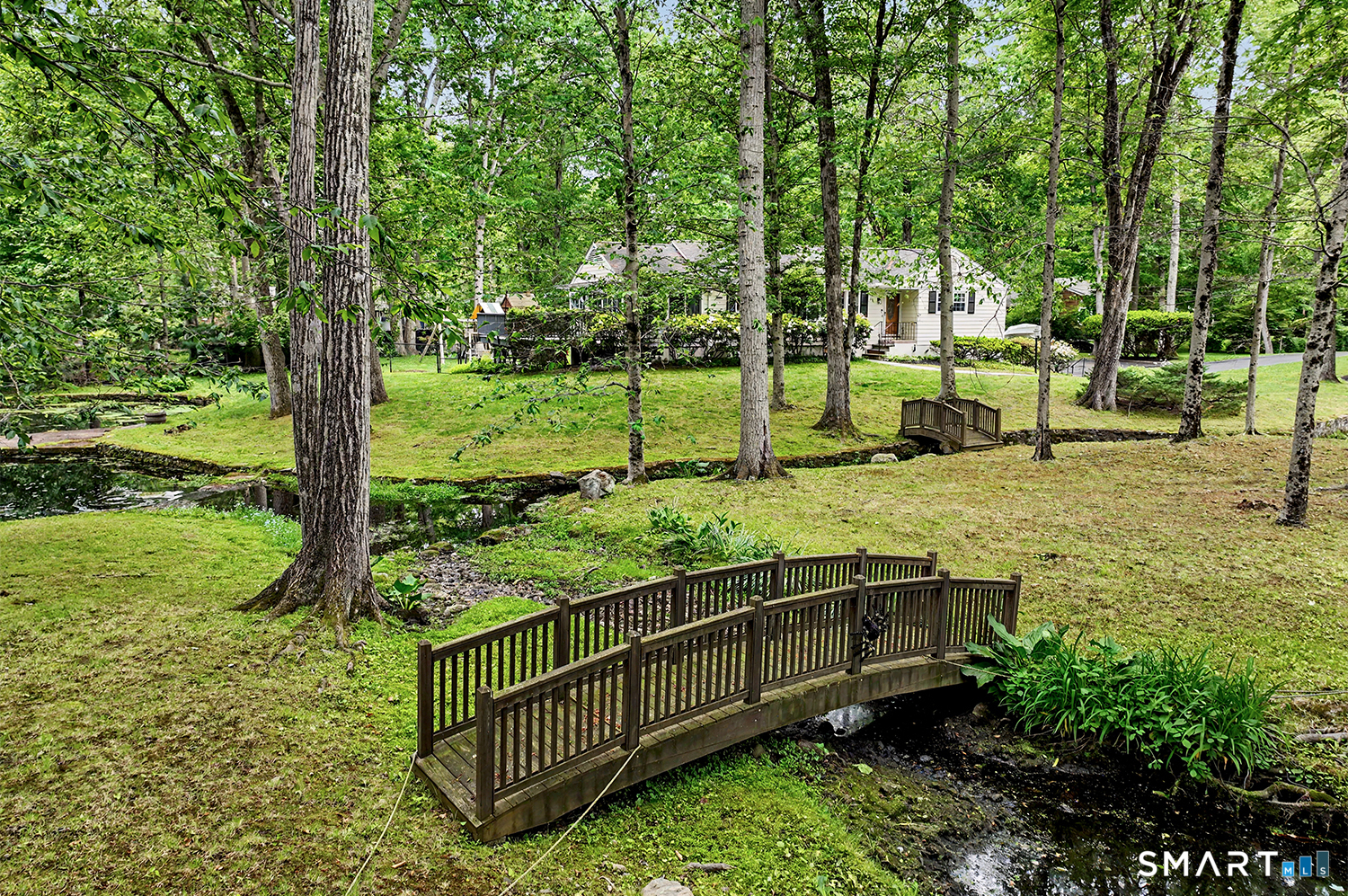 19 Geneva Road Norwalk, CT 06850 - Photo 30 of 33 a view of a garden with plants