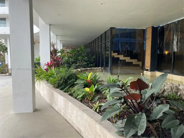 a view of a lobby with gym equipment
