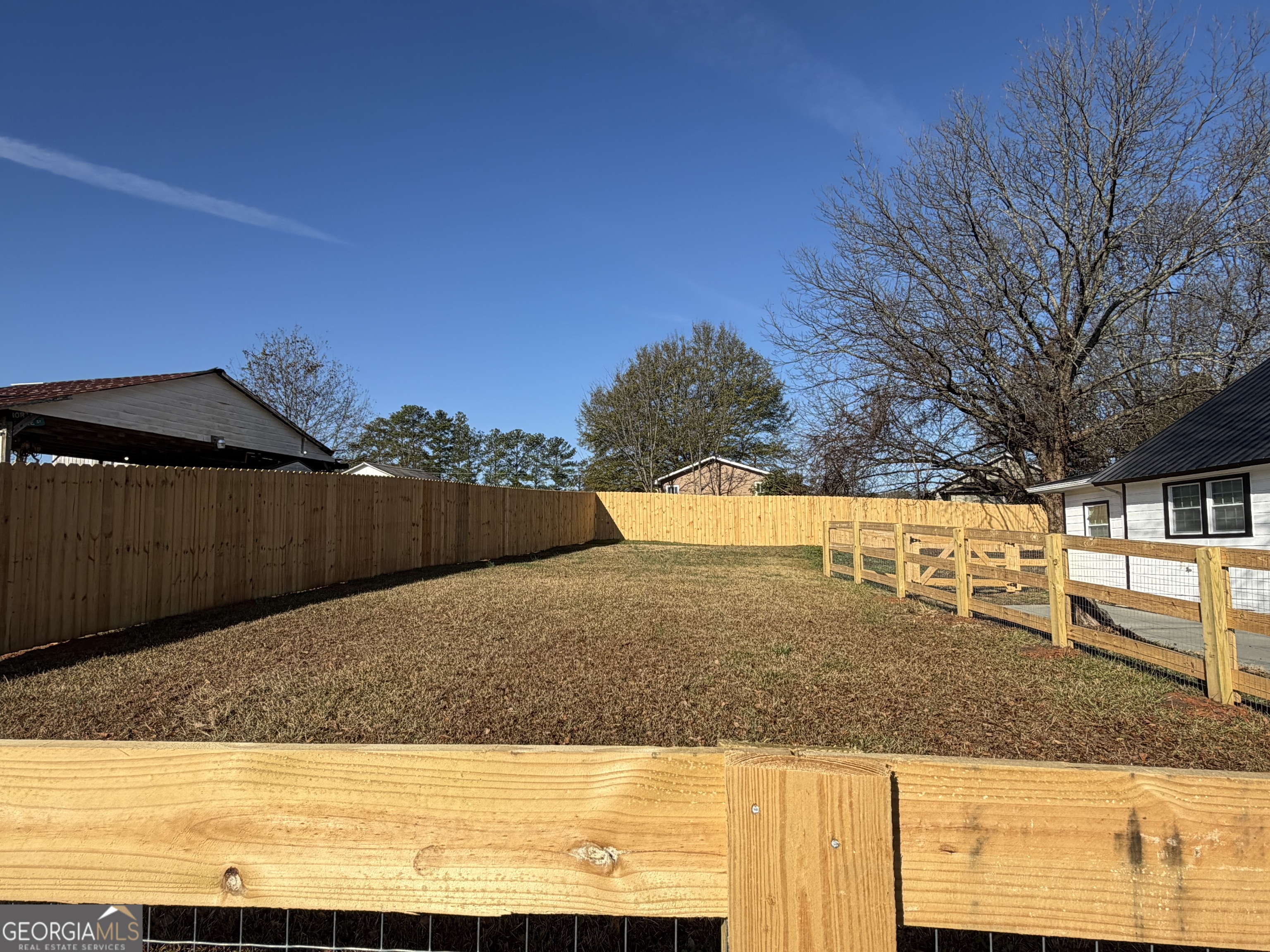 10 Busha Street Toccoa, GA 30577 - Photo 16 of 33 a view of a yard with an outdoor space