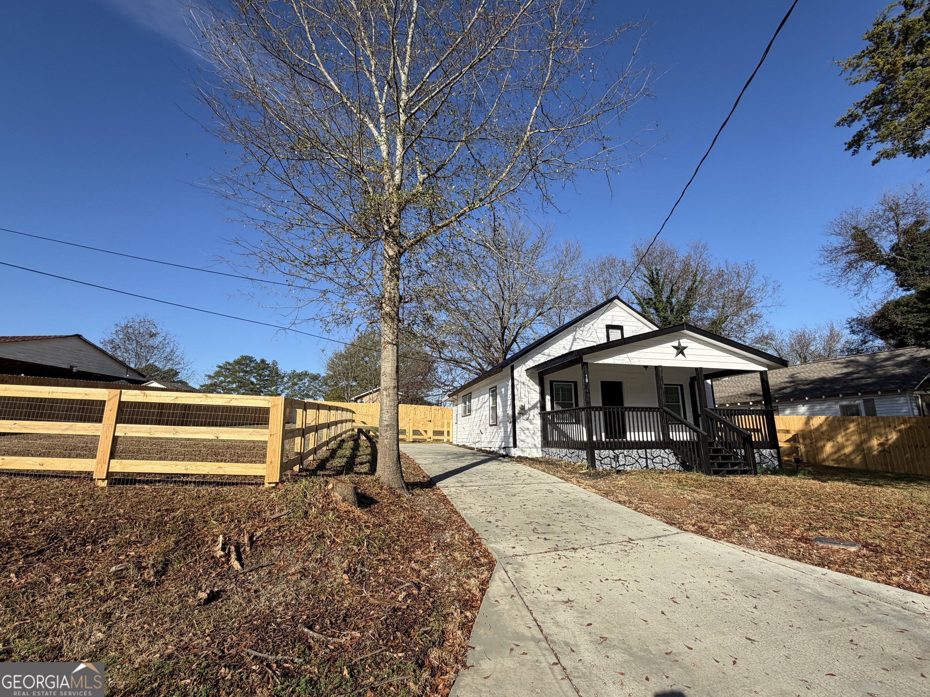 10 Busha Street Toccoa, GA 30577 - Photo 2 of 33 a view of a house with a yard