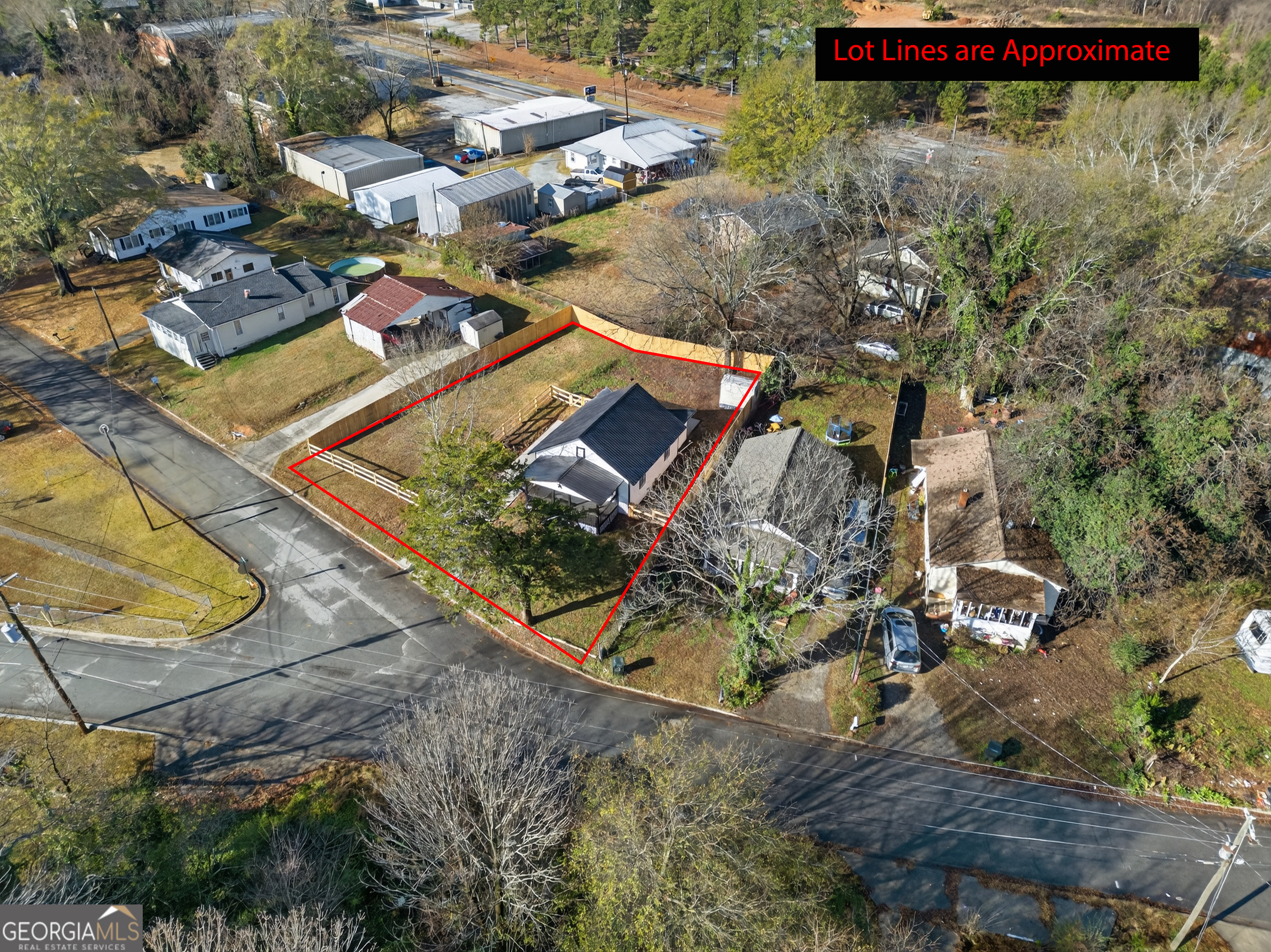 10 Busha Street Toccoa, GA 30577 - Photo 24 of 33 an aerial view of a house with a yard and lake