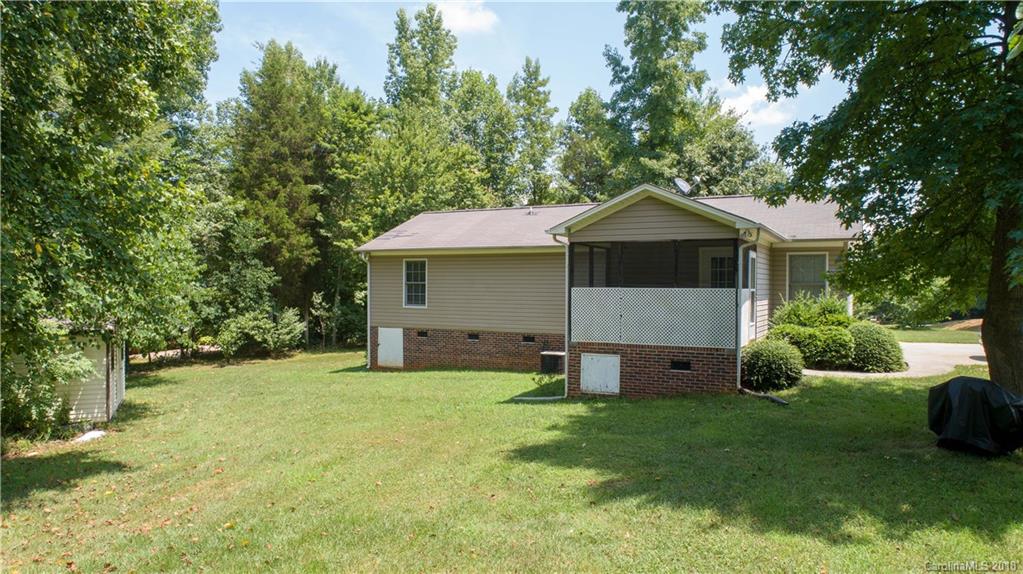 1007 Field Swallow Way, Unit 69 Clover, SC 29710 - Photo 16 of 18 a front view of a house with garden