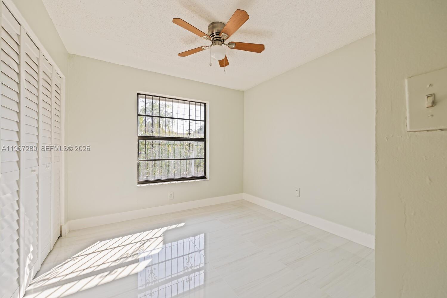 522 Southwest 3rd Avenue Homestead, FL 33030 - Photo 13 of 20 a view of an empty room with a window
