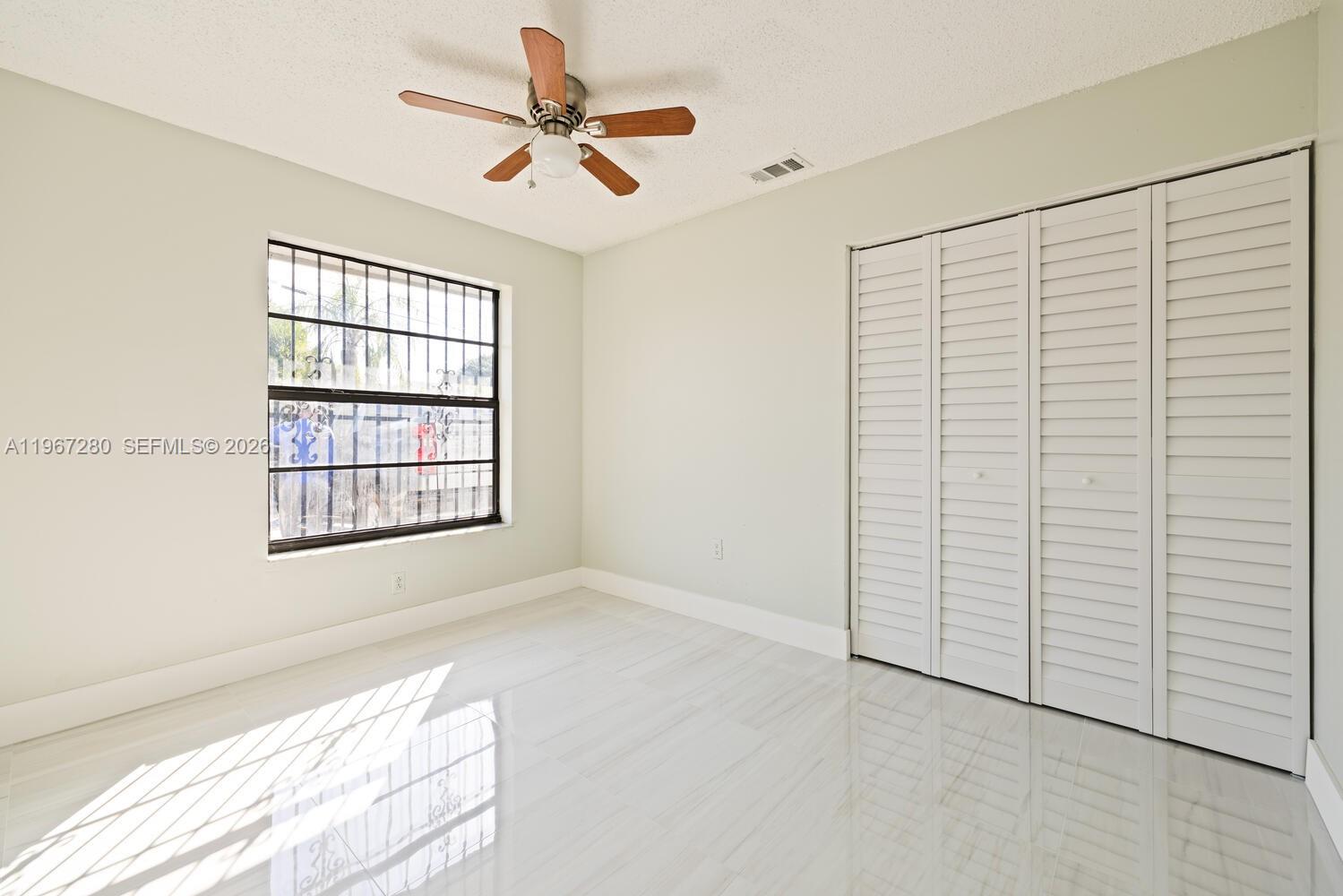 522 Southwest 3rd Avenue Homestead, FL 33030 - Photo 16 of 20 a view of an empty room with a window