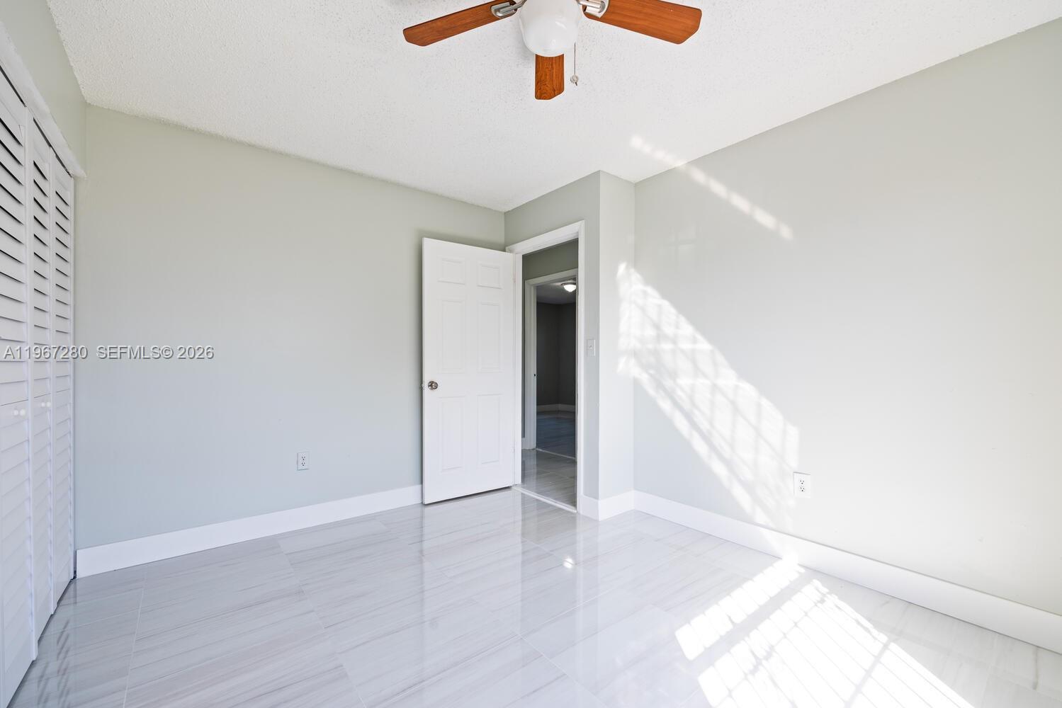 522 Southwest 3rd Avenue Homestead, FL 33030 - Photo 17 of 20 a view of a hallway view with staircase