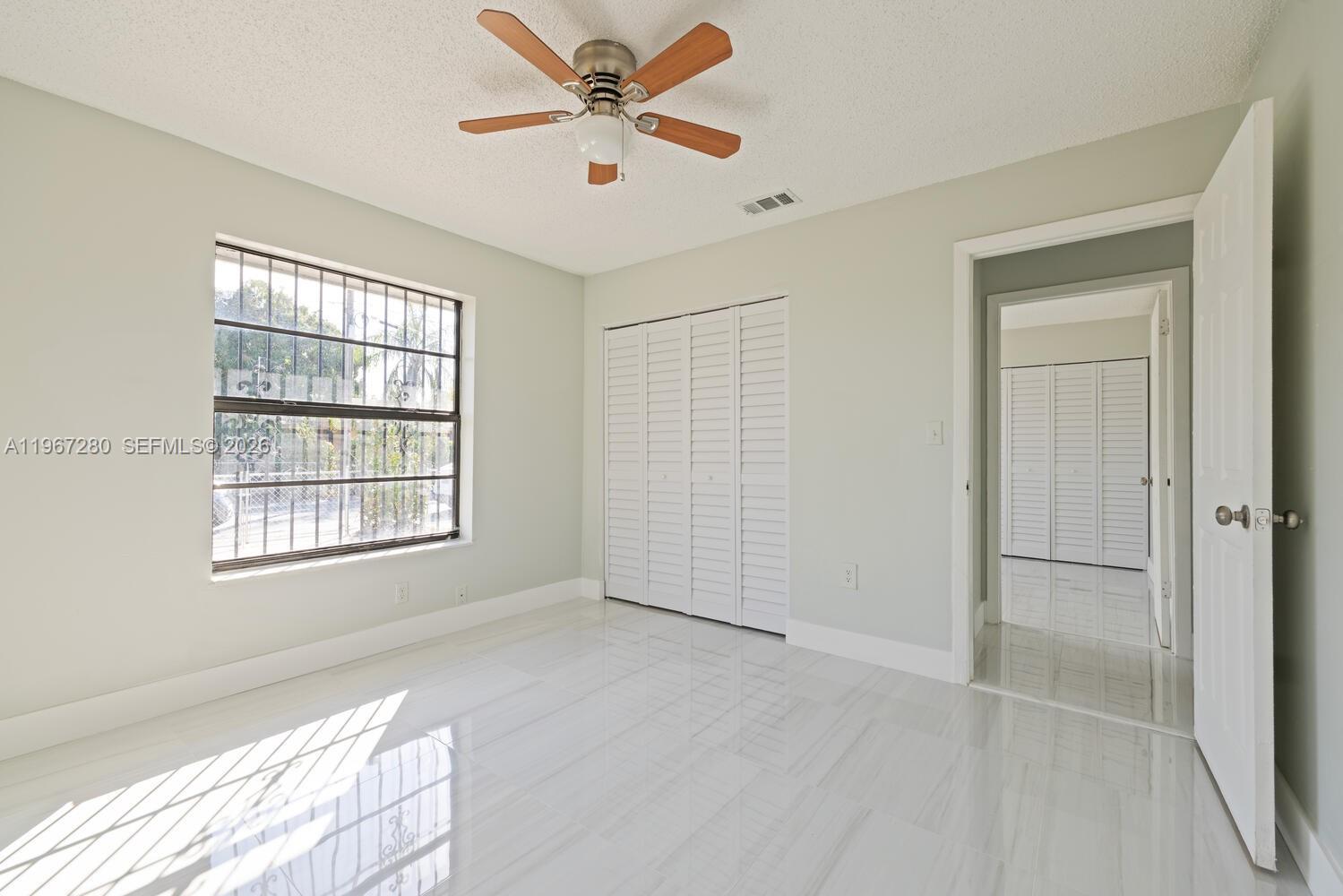 522 Southwest 3rd Avenue Homestead, FL 33030 - Photo 19 of 20 a view of an empty room with a window