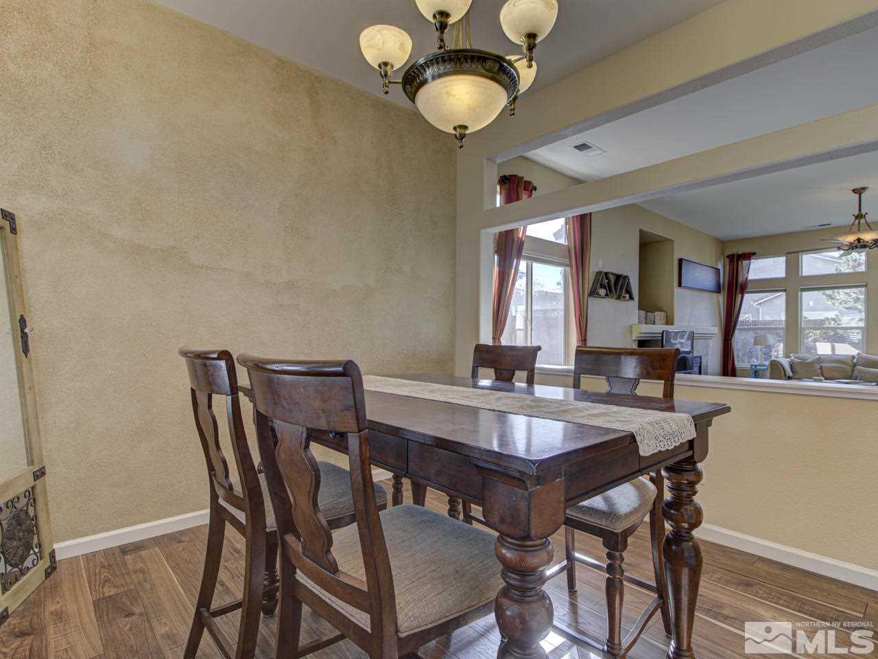 1870 Beringer Way Reno, NV 89521 - Photo 11 of 25 a view of a dining room with furniture and window