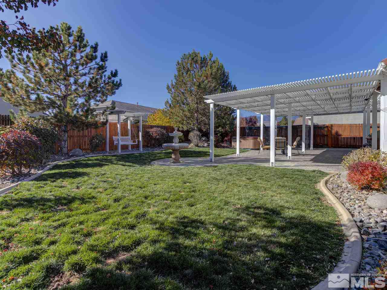 1870 Beringer Way Reno, NV 89521 - Photo 23 of 25 front view of a building with a yard