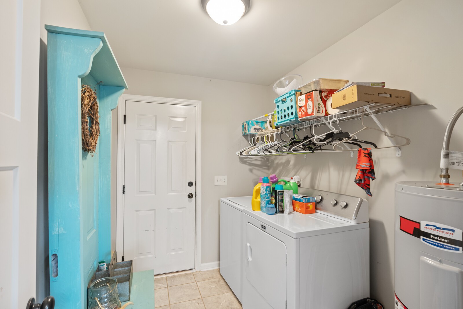 6478 Highway 25 Springfield, TN 37172 - Photo 14 of 30 a storage room with washer and fridge