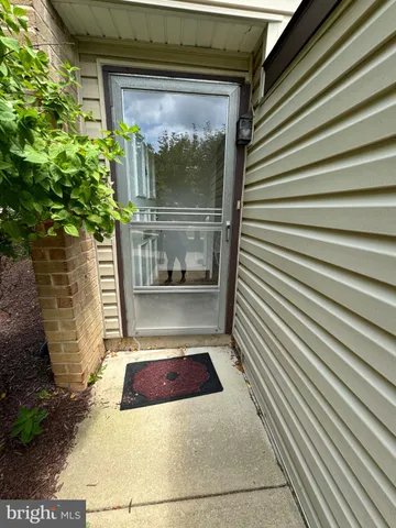 a front view of a house with a garage