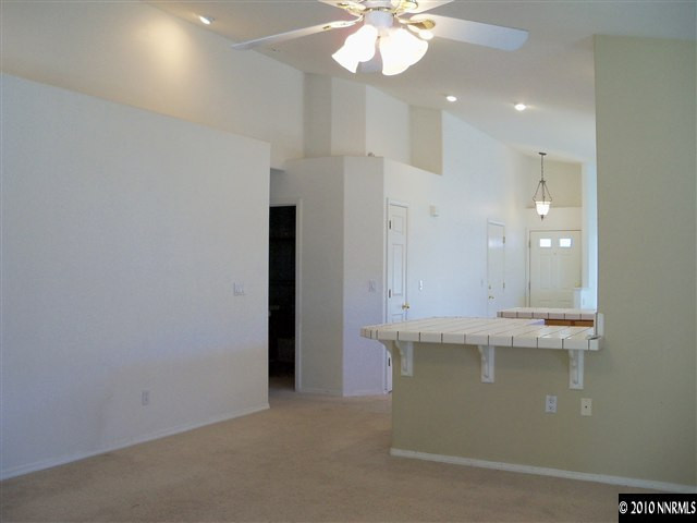 4605 Goodwin Road Sparks, NV 89436 - Photo 2 of 13 wooden floor in an empty room with a sink