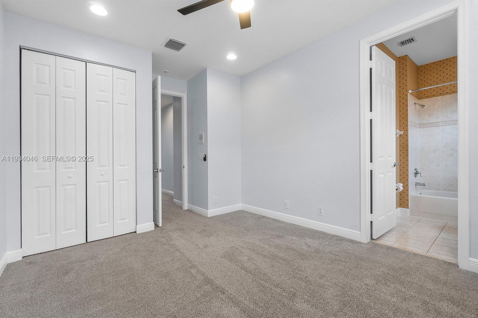 888 University Boulevard Jupiter, FL 33458 - Photo 32 of 41 an empty room with closet area