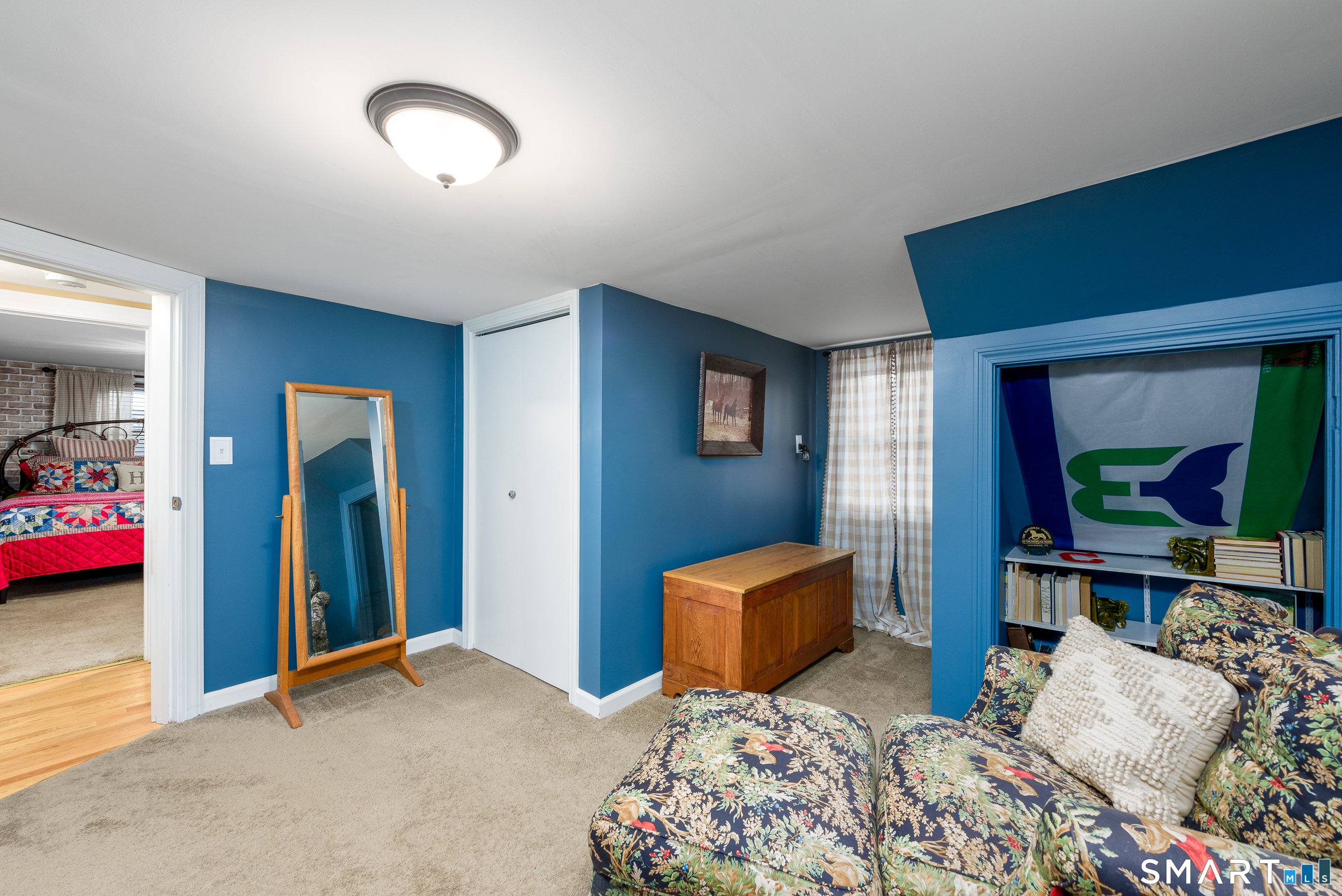 214 Thayer Road Haddam, CT 06441 - Photo 20 of 39 a bedroom with furniture and a window