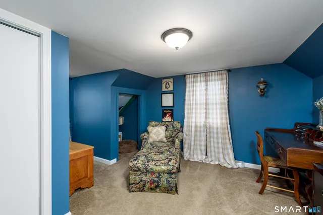 a view of a livingroom with furniture