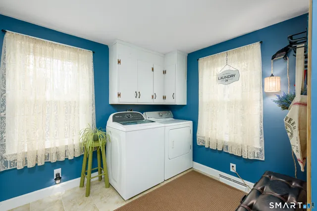 a utility room with dryer and washer