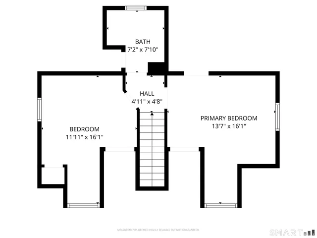 a view of a house with a yard and wooden fence