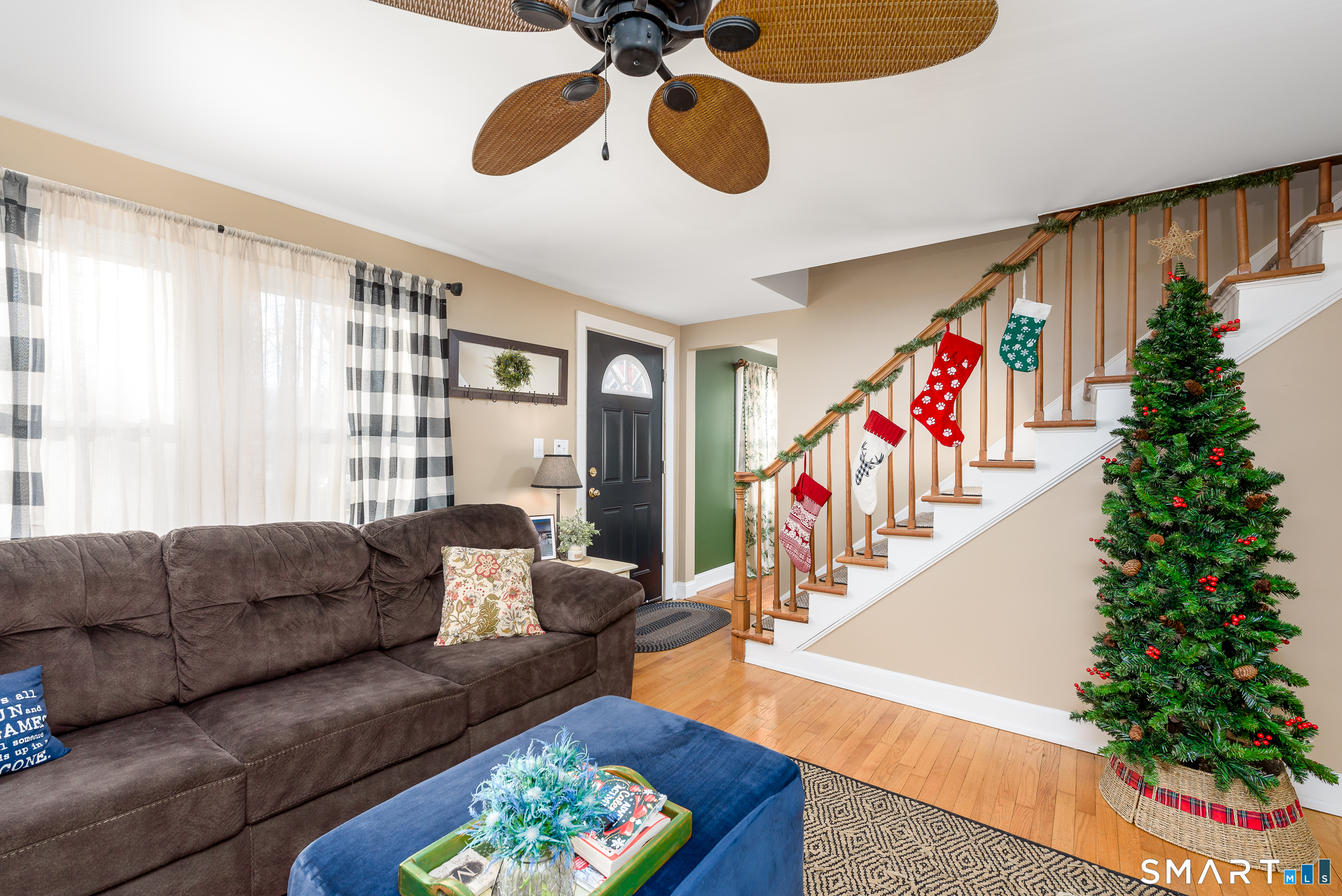 214 Thayer Road Haddam, CT 06441 - Photo 7 of 39 a living room with furniture and a potted plant
