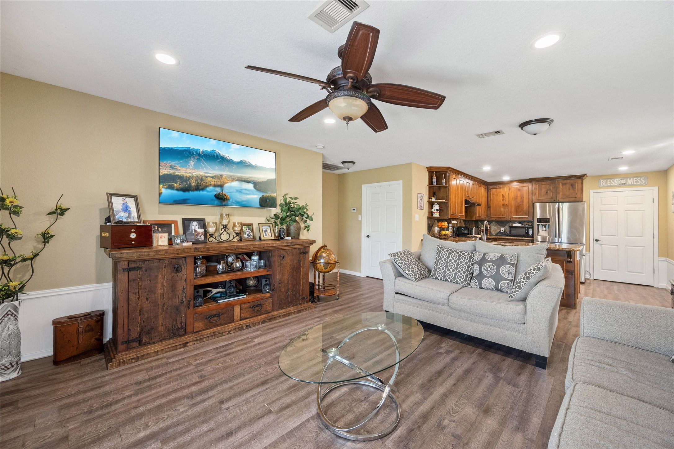 501 County Road 2276 Cleveland, TX 77327 - Photo 13 of 49 a living room with furniture and a flat screen tv