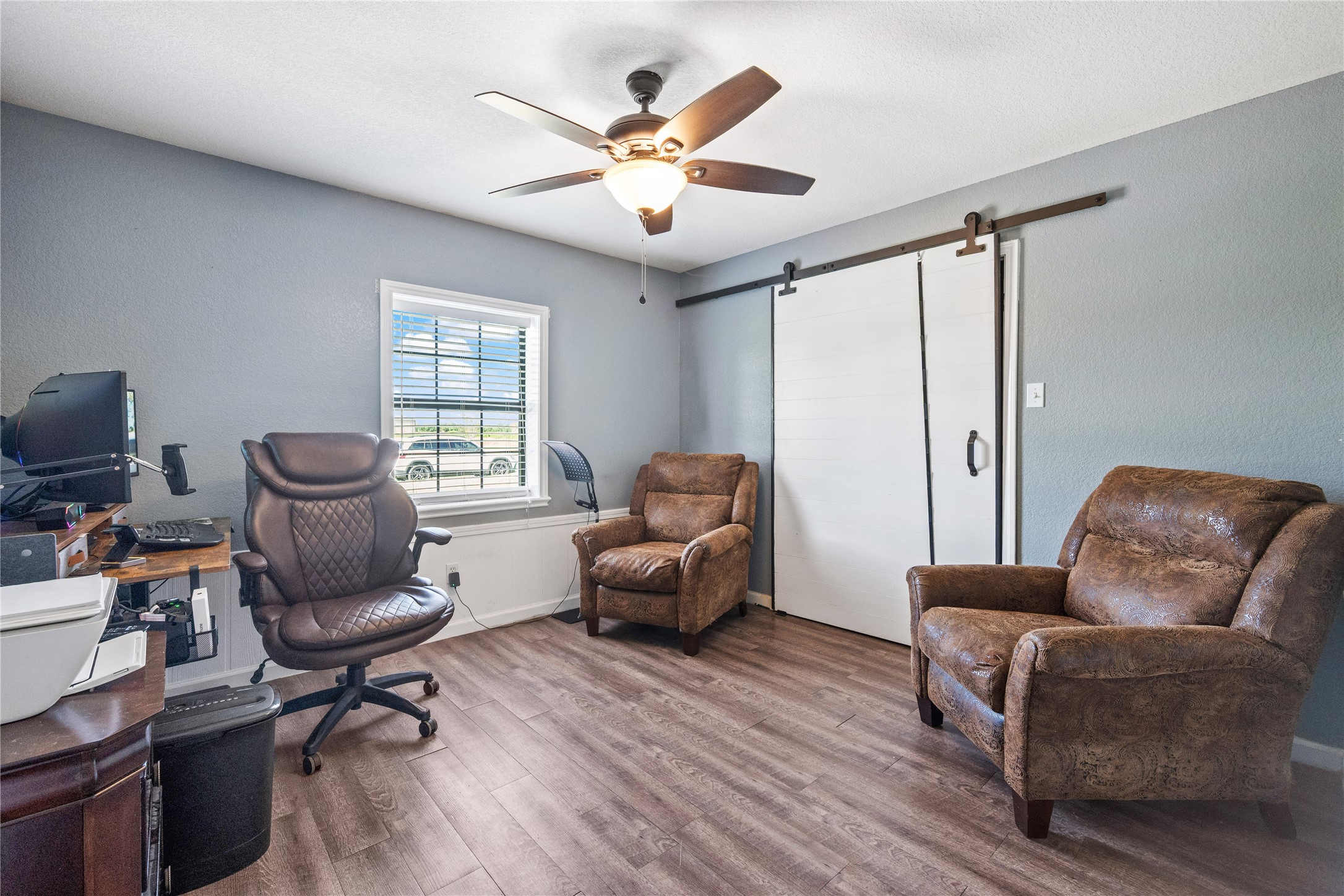 501 County Road 2276 Cleveland, TX 77327 - Photo 20 of 49 a living room with furniture and a large window