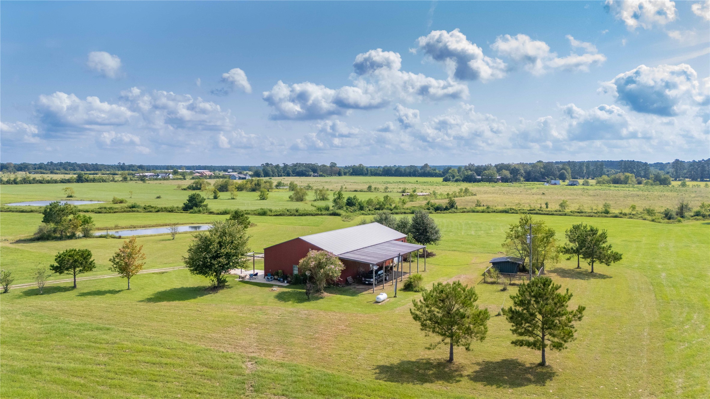 501 County Road 2276 Cleveland, TX 77327 - Photo 2 of 49 a view of a lake view
