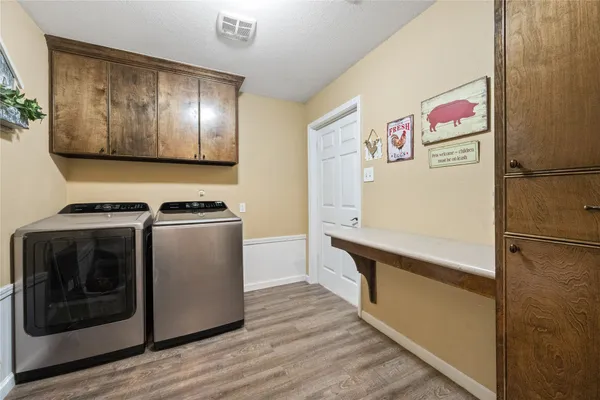 a hallway with toys and stairs