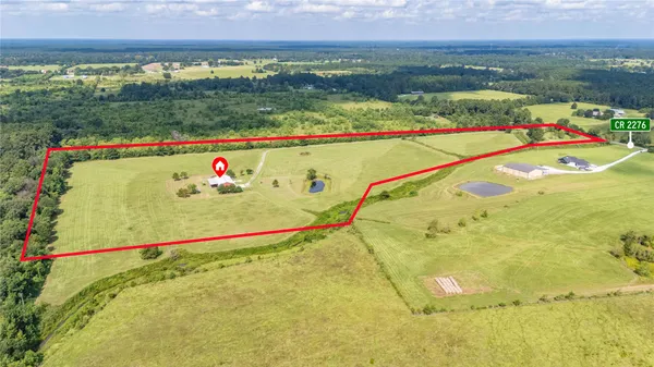 an aerial view of a tennis court
